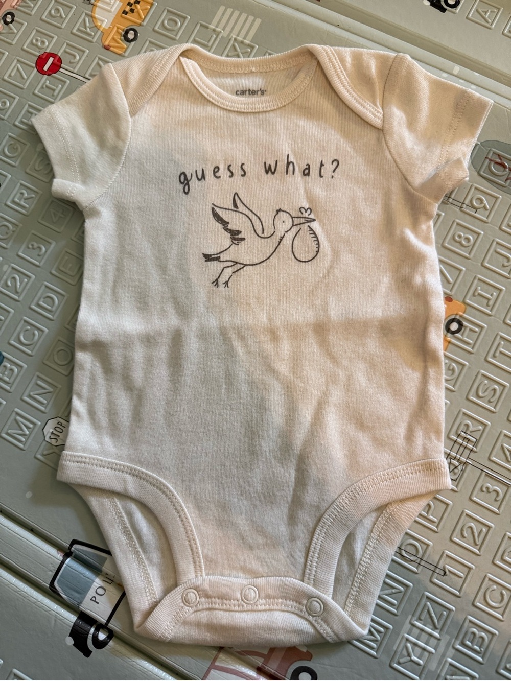 Carter's cream "Guess What?" Stork Baby bodysuit